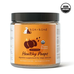 Front of Kin+Kind Organic Healthy Poops supplement for dogs in 8oz jar, supporting digestion and regularity, available at GoodForDogs